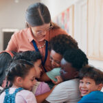 Woman helping kids